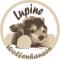 Kreisrundes Logo in braun. Text: "Lupine, Wolfenhausen"